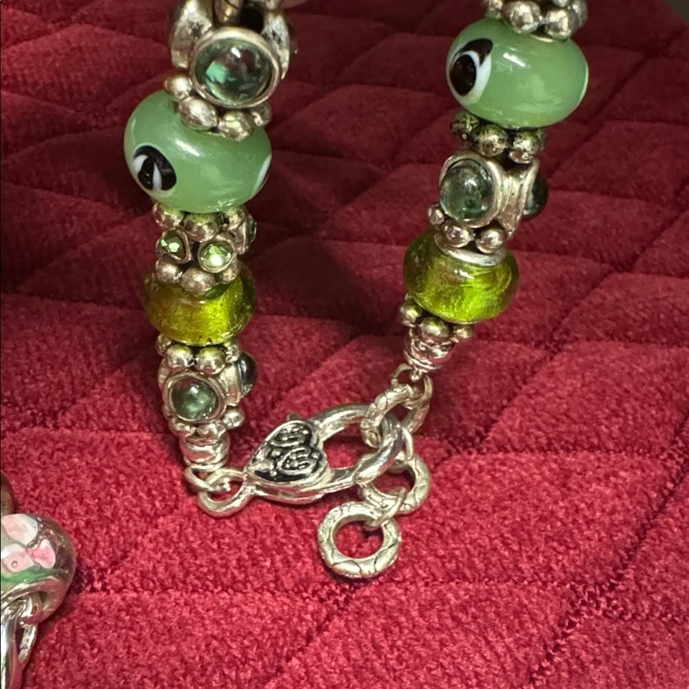 2 glass Bead and Elegant Silver Bracelets. In great condition.